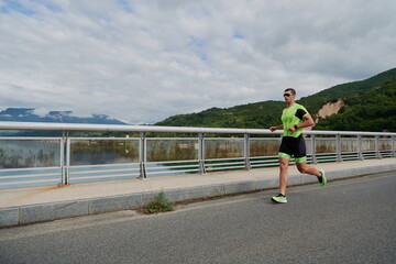 triathlon athlete running on street