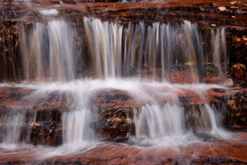 Fototapeta na wymiar Waterfall in the Left Fork North Creek, Zion National Park