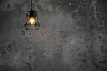 Vintage lightbulb lamps with industrial concept design. Abstract cement background