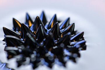 Macro close-up of ferrofluid. Red and blue. High quality photo
