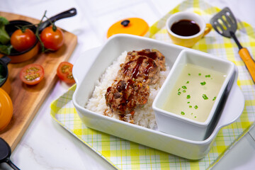 Crispy fried pork bowl full set, rich in nutrients for lunch.