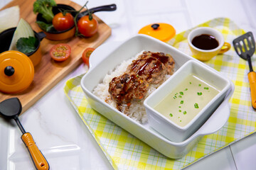 Crispy fried pork bowl full set, rich in nutrients for lunch.