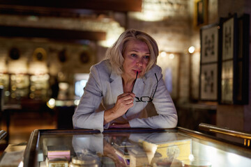 Woman exploring expositions in museum