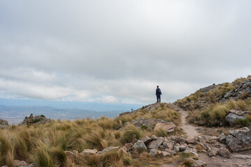 walker contemplating the mountains