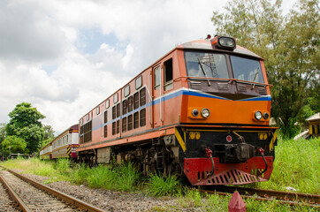 Fototapeta na wymiar Train engines pulling trains out of Thailand