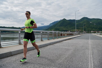 triathlon athlete running on street