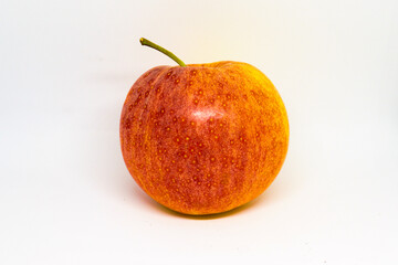 Red Gala apple close up on white background