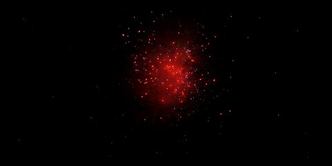 Red fireworks over black sky