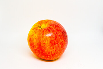 Red Gala apple close up on white background