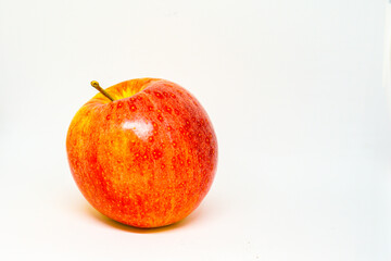 Red Gala apple close up on white background
