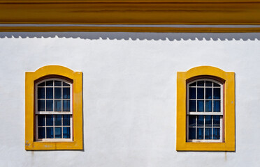 Ancient colonial windows in historical city of Ouro Preto, Brazil  