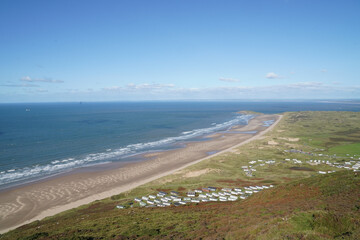 Gower Peninsular Rhossilli Bay Panoramic with Green Hills surrounding the Sandy Bay - Green Welsh Hillsides