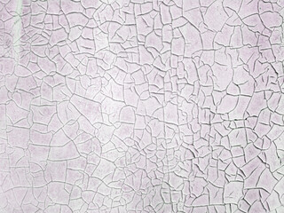 Texture of a painted pink wall with cracks. Concept background, texture.