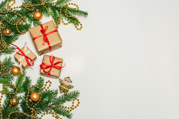 Christmas composition, gifts, fir branches, cones, toys. decorations on a white background