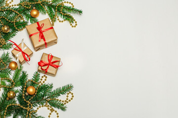Christmas composition, gifts, fir branches, cones, toys. decorations on a white background