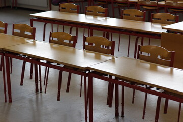 Empty children classroom with chairs and tables