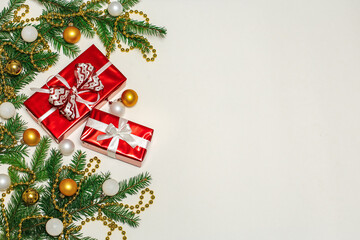 Christmas composition, gifts, fir branches, cones, toys. decorations on a white background