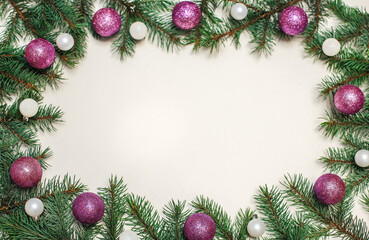 Christmas composition. gifts, fir branches and ornaments balls on a white surface, top view. new year's concept. space for text