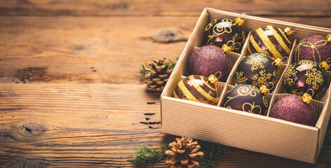 Christmas decoration, Christmas balls in the box on the wooden background