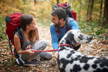 Couples hiking together; Active lifestyle concept