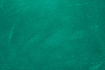 Obraz premium Texture of chalk rubbed out on blackboard or chalkboard background. School education, dark wall backdrop or learning concept.