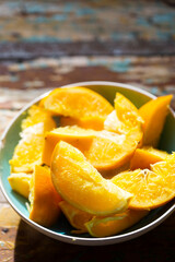 Boiled oranges segments in the bowl 