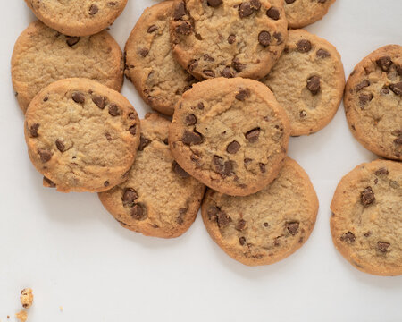 Overhead Shot Of Chocolate Chip Cookies On White Surface