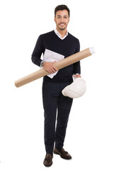 Young architect male smiling, holding white architecture helmet, papers and tube isolated in white background