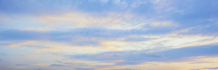 Naklejka na ściany i meble Blue sky and clouds at sunset, background