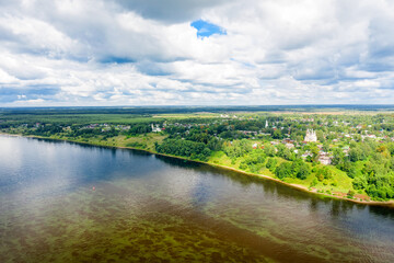 Fototapeta na wymiar Top view of the Romanovskaya side of the city of Tutaev on a summer day