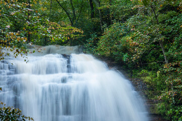 Closeup of waterfall and lush forest in Great Smoky Mountains of North Carolina.