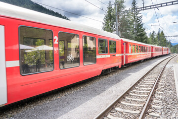 Obraz premium Regional train comes to the station, Switzerland