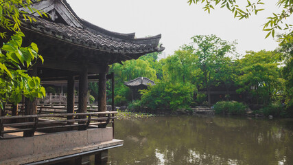 Chinese architecture by water in Shenyuan (Shen Garden) scenic area in Shaoxing, China