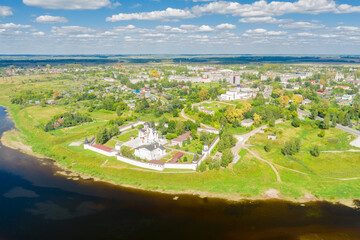 A view from a height of the city of Staritsa and the Holy Dormition Monastery on the banks of the Volga River