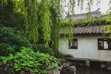 Traditional Chinese architecture by water and trees, Shaoxing, China