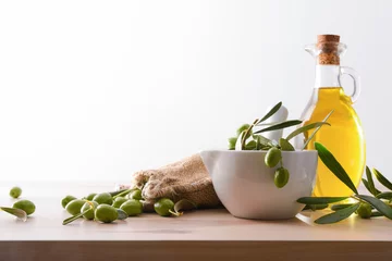 Foto op Plexiglas Natural olive oil homemade from organic farming white background © Davizro Photography