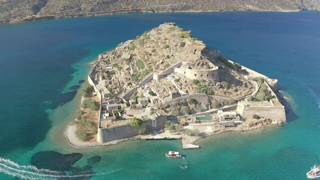 Aerial drone view of the ancient Venetian fortress and former leper colony on Spinalonga on the Greek island of Crete