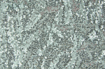 Silver sequins. New year's shiny background.