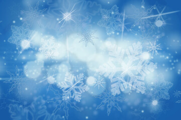 Fototapeta na wymiar Abstract Christmas snow flakes and snowflakes on a blue background.