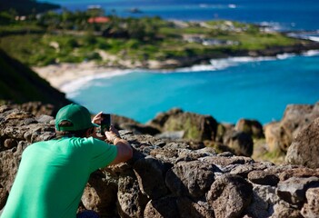Man taking a photo in Hawaii