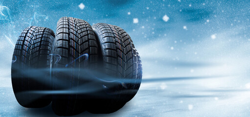 winter tyre cover on Lights on blue and snow background