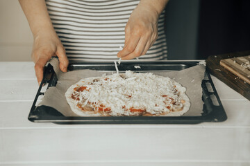homemade pizza is prepared in the oven