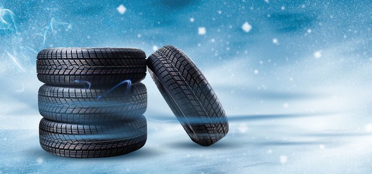 winter tyre cover on Lights on blue and snow background