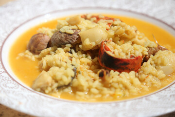 seafood spanish rice with lobster and clams