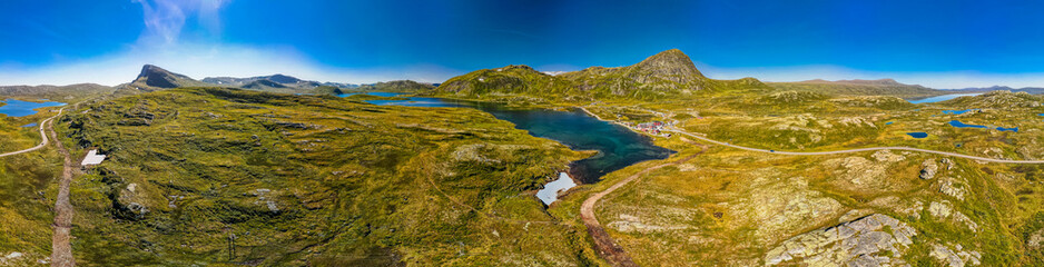 Fototapeta premium Hiking in Jotunheimen National Park in Norway, Synshorn Mountain
