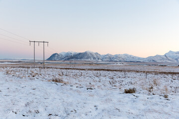 Winter sunrise with electricity pylons in Iceland	