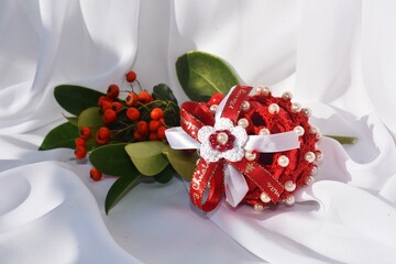 Unique handmade  crocheted Christmas tree decoration on white background. Christmas globe.