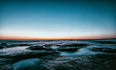 sunset over the blue sea