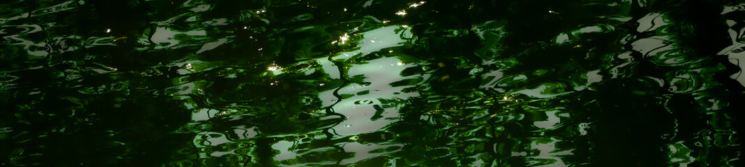 the sun is reflected in the water
