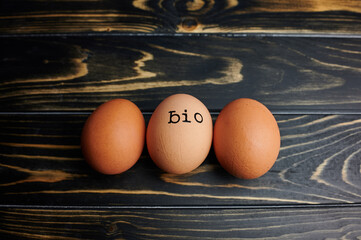the German word BIO which means in English ORGANIC stamped on an egg lying between two others on...